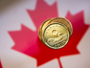 FILE PHOTO: A Canadian dollar coin, commonly known as the "Loonie", is pictured in this illustration picture taken in Toronto, January 23, 2015.    REUTERS/Mark Blinch (CANADA - Tags: BUSINESS)/File Photo ORG XMIT: FW1