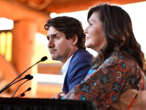 Canada's Prime Minister Justin Trudeau and Kukpi7 Rosanne Casimir speak to the media and Tk'emlups te Secweepemc community members and First Nations leaders at the Tk'emlups Pow wow Arbour in B.C., Oct. 18, 2021.
