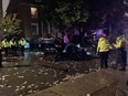 A car was flipped by revellers at a post-Panda street party on Russell Avenue, Oct. 2, 2021. Some residents said the vehicle was flipped multiple times.