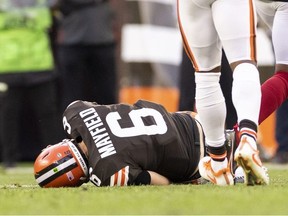 Cleveland Browns quarterback Baker Mayfield (6) lays on the ground from an injury during the third quarter against the Arizona Cardinals at FirstEnergy Stadium.