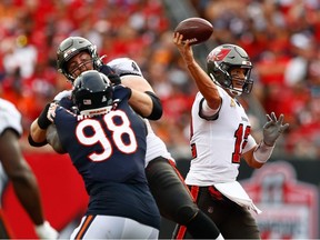 Tampa Bay Buccaneers quarterback Tom Brady throws a pass in the first half against the Chicago Bears at Raymond James Stadium.