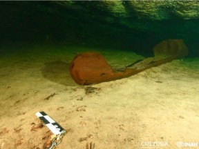 Archeologists locate a wooden canoe used by the ancient Maya in a cenote