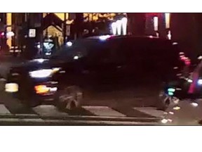 A dark-coloured SUV involved in a hit and run in downtown Toronto on Friday evening