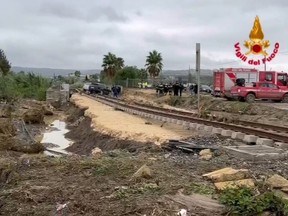 A screengrab taken from a video shows debris after heavy rain caused flooding in Scordia, near Catania, Italy, October 25, 2021.