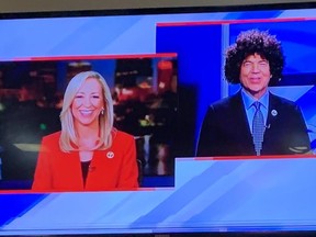 A KATV anchor wears an afro wig on air