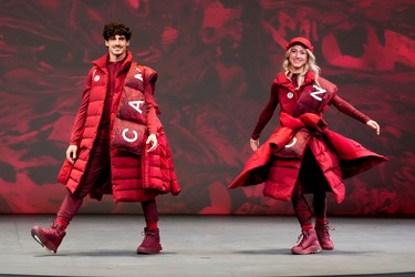 Athletes reveal the Lululemon Athletica's Team Canada uniforms for the Beijing 2022 Winter Olympics, in Toronto, Tuesday, Oct. 26, 2021.