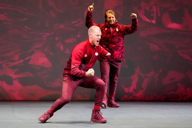 Athletes reveal the Lululemon Athletica's Team Canada uniforms for the Beijing 2022 Winter Olympics, in Toronto, Tuesday, Oct. 26, 2021.