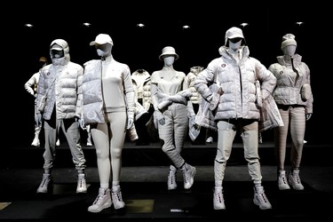 Mannequins dressed with the Lululemon Athletica's Team Canada uniforms for the Beijing 2022 Winter Olympics, in Toronto, Tuesday, Oct. 26, 2021.