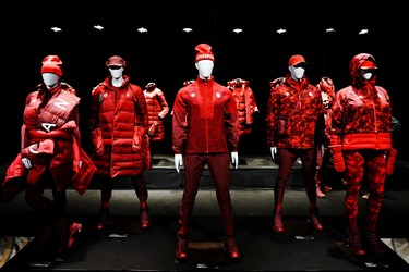 Mannequins dressed with the Lululemon Athletica's Team Canada uniforms for the Beijing 2022 Winter Olympics, in Toronto, Tuesday, Oct. 26, 2021.