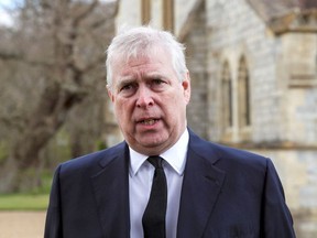 Britain's Prince Andrew speaks to the media during Sunday service at the Royal Chapel of All Saints at Windsor Great Park, Britain following Friday's death of his father Prince Philip at age 99, April 11, 2021.