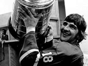 Serge Savard, of the Montreal Canadiens, celebrates Stanley Cup victory after defeating the Boston Bruins at Boston Garden in 1977.
