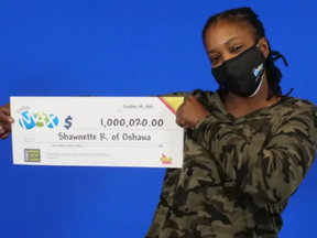 Shawnette Rowe, 50, holding her $1 million lottery win