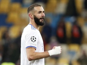 Real Madrid's Karim Benzema celebrates after a match on  Oct. 19, 2021.