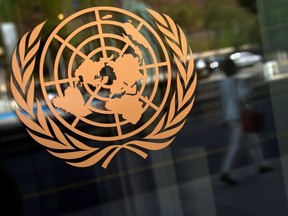 The logo of the United Nations is seen on the outside of its headquarters in New York, September 15, 2013.