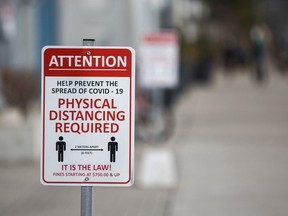 Pandemic protocol sign in the Humber Bay Shores neighbourhood in Toronto, Ont. on Thursday March 11, 2021.