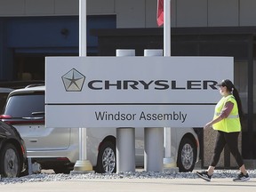 A worker is shown at the Stellantis Windsor Assembly Plant on Thursday, October 14, 2021. Canada's automakers have decided on a mandatory vaccination policy across the board.