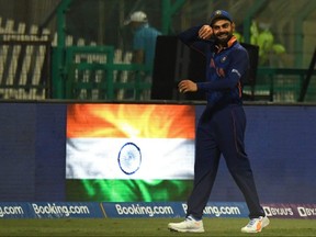 India's captain Virat Kohli reacts during a ICC Twenty20 World Cup cricket match between India and Afghanistan at the Sheikh Zayed Cricket Stadium in Abu Dhabi on Nov. 3, 2021.