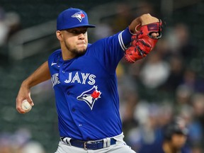 Jose Berrios #17 of the Toronto Blue Jays delivers a pitch against the Minnesota Twins in the first inning of the game at Target Field on September 24, 2021 in Minneapolis.