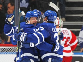 Mitch Marner of the Toronto Maple Leafs celebrates his first goal of the season against the Detroit Red Wings at Scotiabank Arena on October 30, 2021.