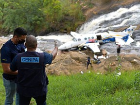 The wreckage of a small airplane that crashed with Brazilian country singer  Marilia Mendonca, 26, aboard lies near a waterfall area in Piedade de  Caratinga, state of Minas Gerais, Brazil, November 5