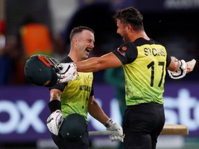 Australia's Matthew Wade (left) and Marcus Stoinis celebrate after beating Pakistan.