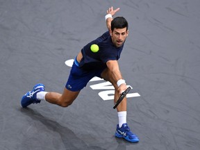 Novak Djokovic of Serbia in action during practice ahead of the Rolex Paris Masters at AccorHotels Arena on October 31, 2021 in Paris, France.