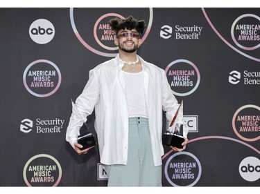 LOS ANGELES, CALIFORNIA - NOVEMBER 21: Bad Bunny, winner of the Favorite Male Latin Artist award, poses in the press room at the 2021 American Music Awards at Microsoft Theater on November 21, 2021 in Los Angeles, California.
