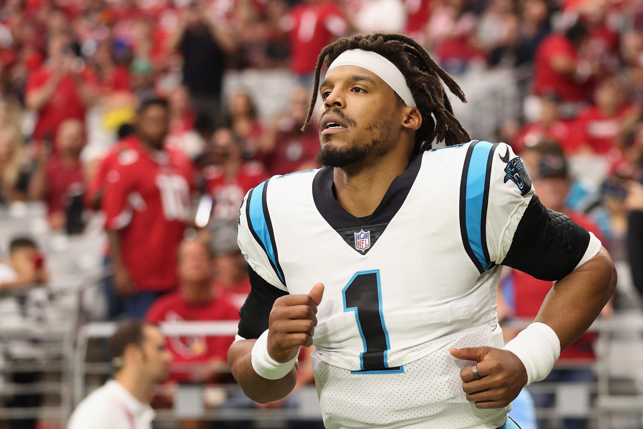 Cam Newton's 3 TD passes help Panthers beat Lions 27-24