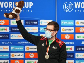Canada’s Laurent Dubreuil celebrates with the silver medal on the podium after the 500m race in Tomaszow Mazowiecki, Poland, Sunday.