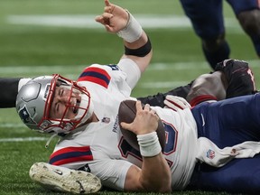 Quarterback Mac Jones and the Patriots have won five games in a row and take on the struggling Titans on Sunday.