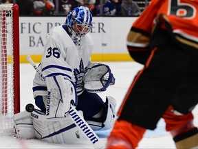 Maple Leafs goaltender Jack Campbell blocks a shot against Ducks’ Rickard Rakell on the weekend.