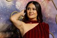 Salma Hayek poses on the blue carpet at the U.K. premiere of Eternals.