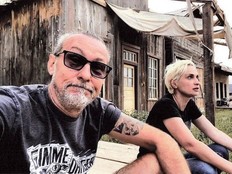 This undated handout image released by Dordick Law Corporation on November 10, 2021 shows chief lighting technician Serge Svetnoy (L) taking a 'selfie' with cinematographer Halyna Hutchins on the set of the movie "Rust" in Santa Fe, New Mexico.