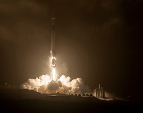 In this handout image courtesy of NASA released on November 23, 2021, the SpaceX Falcon 9 rocket launches with the Double Asteroid Redirection Test, or DART, spacecraft onboard. (Photo by BILL INGALLS/NASA/AFP via Getty Images)
