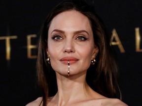Cast member Angelina Jolie poses at the premiere for the film "Eternals" in Los Angeles, Oct. 18, 2021.