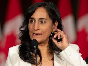 Newly sworn in Minister of National Defence Anita Anand  speaks during a press conference in Ottawa, Oct. 26, 2021.