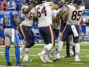 The Chicago Bears celebrate their win over the Lions at Ford Field in Detroit Thursday. USA TODAY SPORTS