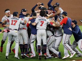 The Braves celebrate their 7-0 victory against the Astros in Game 6 to win the 2021 World Series at Minute Maid Park in Houston, Tuesday, Nov. 2, 2021.