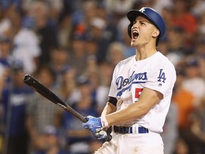 Corey Seager of the Los Angeles Dodgers celebrates after hitting a two-run home run against the Houston at Dodger Stadium on October 25, 2017 in Los Angeles.