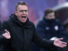 Then-Leipzig's head coach Ralf Rangnick gestures during the German first division Bundesliga soccer match between RB Leipzig and TSG 1899 Hoffenheim in Leipzig, Germany, Monday, Feb. 25, 2019.