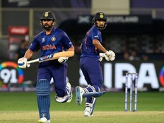 India’s Rohit Sharma (left) and K.L. Rahul run between the wickets during the ICC mens Twenty20 World Cup cricket match between India and Scotland at the Dubai International Cricket Stadium yesterday. Getty Images