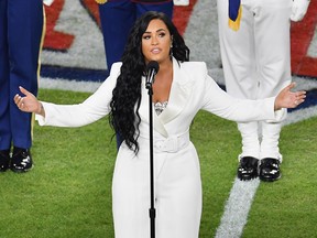 Demi Lovato sings the national anthem during Super Bowl LIV at Hard Rock Stadium in Miami Gardens, Florida, on February 2, 2020.