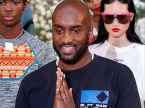 Designer Virgil Abloh appears at the end of his Spring/Summer 2020 collection show for his label Off-White during Men's Fashion Week in Paris, June 19, 2019.