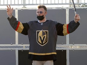 Vegas Golden Knights forward Jack Eichel celebrates a kid's goal as he participates in a youth clinic at a ball hockey rink at the Boys & Girls Clubs of Southern Nevada on November 8, 2021 in North Las Vegas, Nevada.