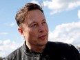 SpaceX founder and Tesla CEO Elon Musk looks on as he visits the construction site of Tesla's gigafactory in Gruenheide, near Berlin, Germany, May 17, 2021.