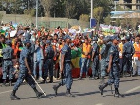 Members of the Ethiopian Federal Police patrol during a pro-government rally to denounce what the organizers say is the Tigray People’s Liberation Front and the Western countries' interference in internal affairs of the country, at Meskel Square in Addis Ababa, Ethiopia, Sunday, Nov. 7, 2021.