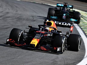 Max Verstappen leads Lewis Hamilton during the F1 Grand Prix of Brazil at Autodromo Jose Carlos Pace on November 14, 2021 in Sao Paulo, Brazil.