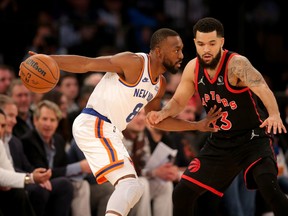 Knicks' Kemba Walker controls the ball against Raptors' Fred VanVleet during the first quarter at Madison Square Garden on Monday, Nov. 1, 2021.