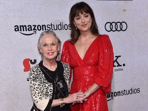 Dakota Johnson and her grandmother Tippi Hedren arrive for the Amazon Studios Los Angeles premiere of "Suspiria" at the Arclight Hollywood Cinerama Dome in Hollywood, Calif., on Oct. 24, 2018.