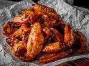 Chicken wings will be eaten by the ton on Super Bowl Sunday at all kinds of bars in Toronto.  They are happy to be able to dine in person this year.